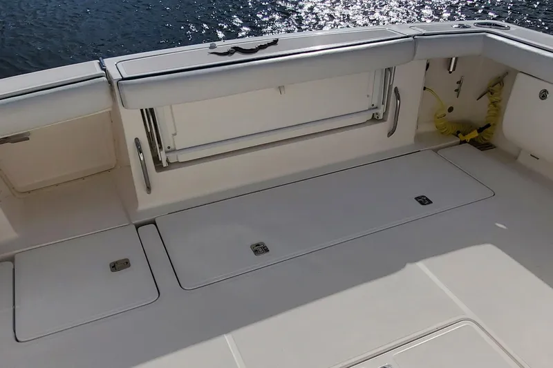 Cruse Yacht Photos Pics 2006 Tiara Yachts 4200 Open deck with storage compartments and seating.