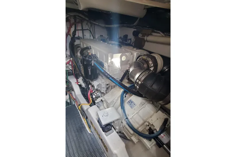 Cruse Yacht Photos Pics Engine room of a 2006 Tiara Yachts 4200 Open, showcasing mechanical components.