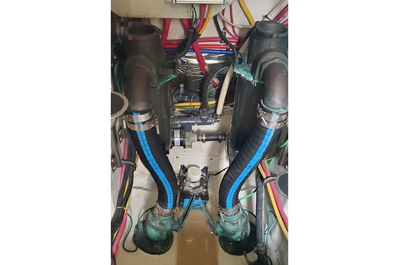 Cruse Yacht Photos Pics Engine compartment of a 2006 Tiara Yachts 4200 Open, showing hoses and wiring.