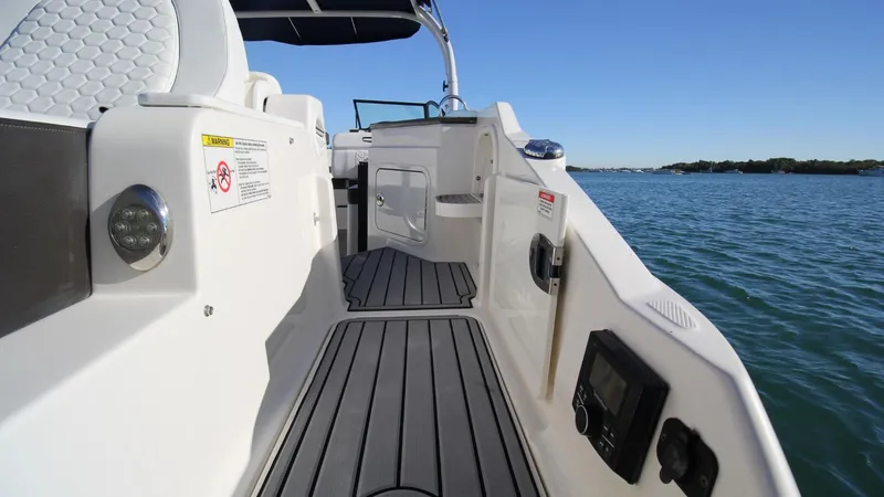 Finding Dori Yacht Photos Pics 2017 Sea Ray SDX 290 Outboard boat deck with sleek design on calm water.