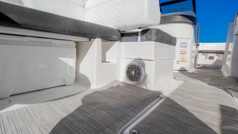 Finding Dori Yacht Photos Pics 2017 Sea Ray SDX 290 Outboard interior with seating and speaker detail.