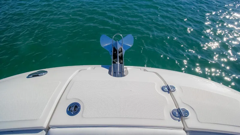 Finding Dori Yacht Photos Pics 2017 Sea Ray SDX 290 Outboard boat deck with anchor, on sparkling water.