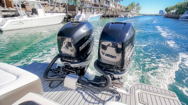 Finding Dori Yacht Photos Pics 2017 Sea Ray SDX 290 Outboard cruising on a sunny waterway.