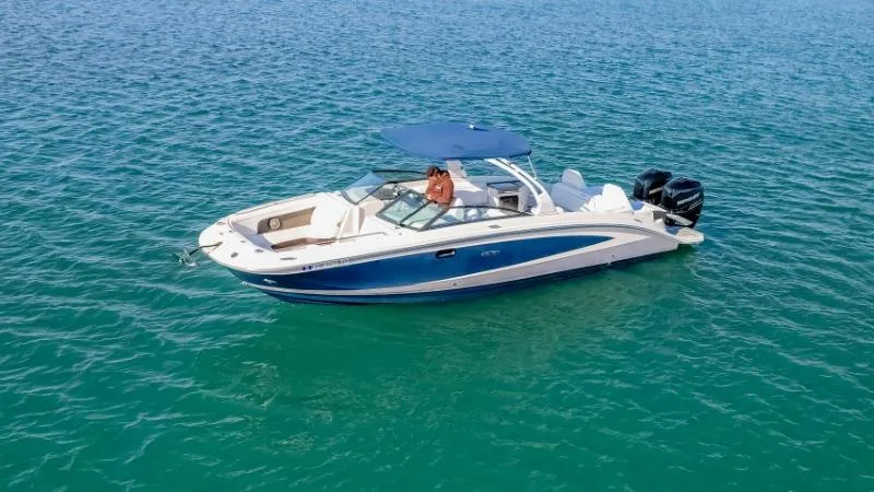 Finding Dori Yacht Photos Pics 2017 Sea Ray SDX 290 Outboard boat on clear blue water, featuring a sleek design and canopy.