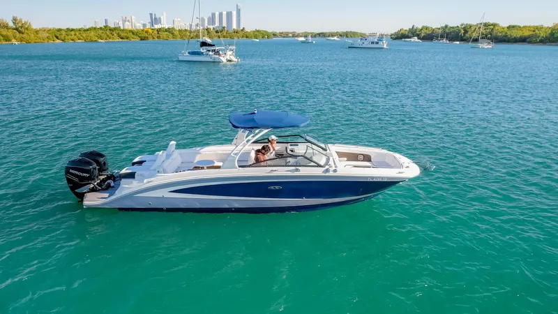 Finding Dori Yacht Photos Pics 2017 Sea Ray SDX 290 Outboard boat cruising on a sunny day.