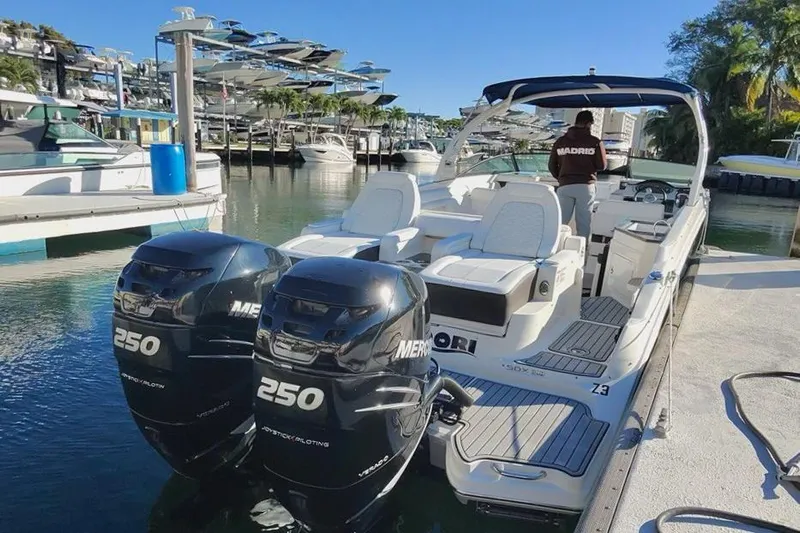 Finding Dori Yacht Photos Pics 2017 Sea Ray SDX 290 Outboard boat docked, featuring twin Mercury 250 engines.
