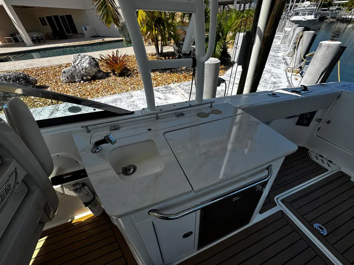  Yacht Photos Pics 2019 Boston Whaler 270 Vantage boat interior with sink and countertop near marina.