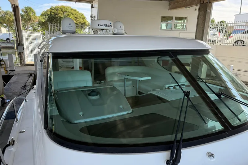  Yacht Photos Pics 2011 Tiara Yachts 4500 Sovran with Garmin equipment, docked in a marina.