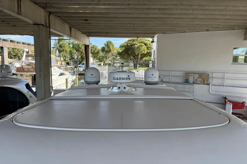  Yacht Photos Pics 2011 Tiara Yachts 4500 Sovran with Garmin equipment in a covered dock.