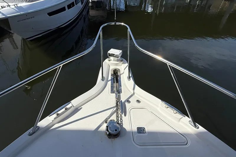  Yacht Photos Pics Bow view of 2011 Tiara Yachts 4500 Sovran, featuring anchor and railing.