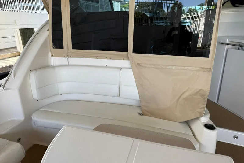  Yacht Photos Pics Interior seating area of 2011 Tiara Yachts 4500 Sovran with beige and white upholstery.