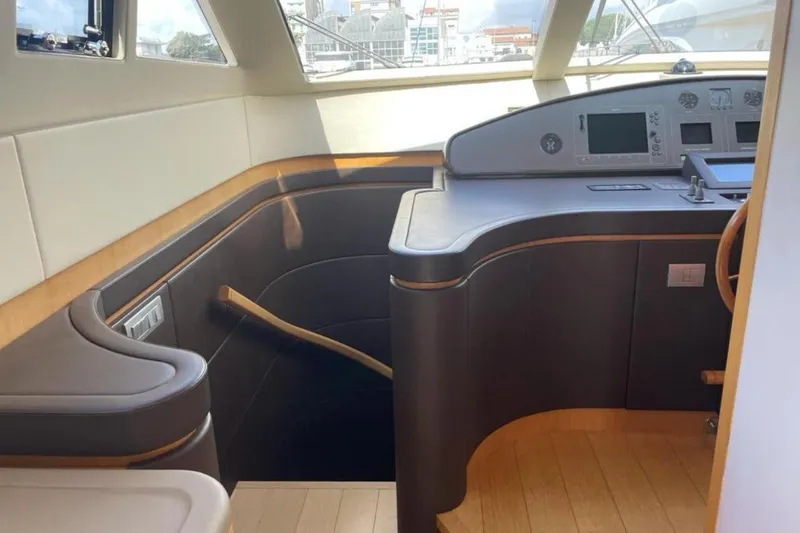  Yacht Photos Pics Interior of 2010 Sanlorenzo SL72 yacht, featuring a sleek helm and modern design.
