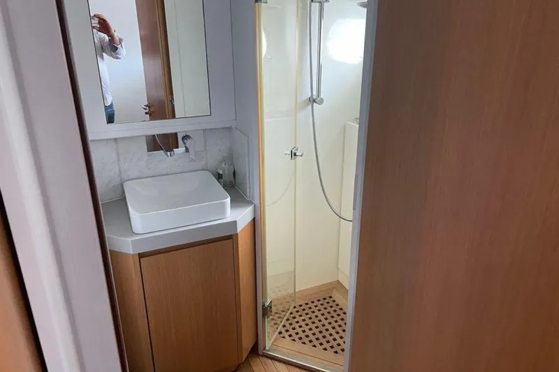  Yacht Photos Pics Bathroom interior of 2010 Sanlorenzo SL72 yacht with modern sink and shower.