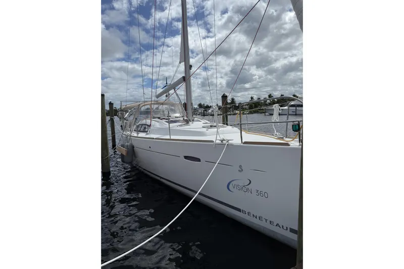 Vision 360 Yacht Photos Pics Sailboat docked, Beneteau First 435, 2012 model, under cloudy sky.