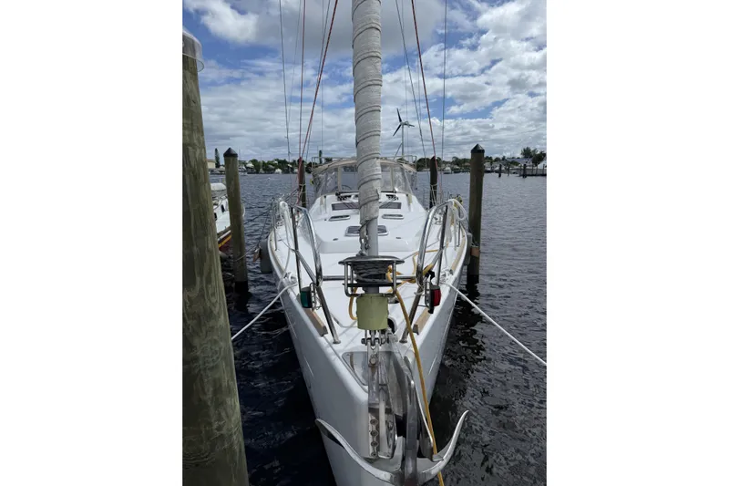 Vision 360 Yacht Photos Pics Beneteau First 435 sailboat docked, 2012 model, with wrapped mast and clear sky.