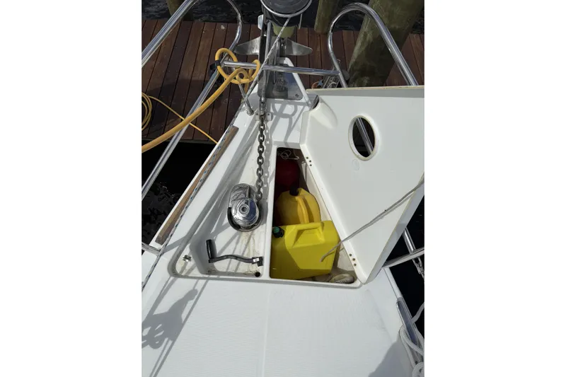 Vision 360 Yacht Photos Pics Beneteau First 435 sailboat anchor locker with chain and yellow fuel container, 2012 model.