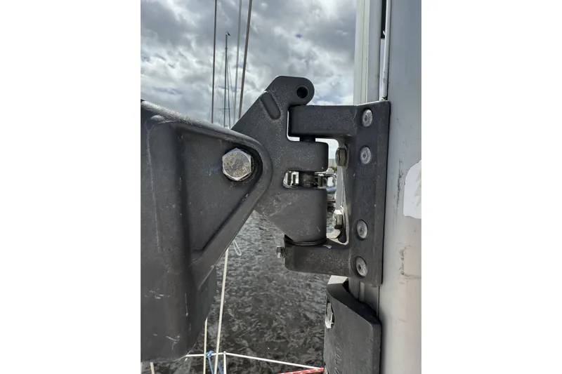 Vision 360 Yacht Photos Pics Close-up of Beneteau First 435 sailboat rigging component, 2012 model, against cloudy sky.