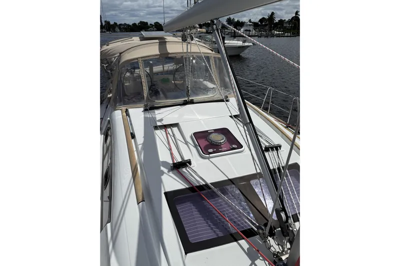 Vision 360 Yacht Photos Pics 2012 Beneteau First 435 sailboat deck with rigging and canopy in marina.
