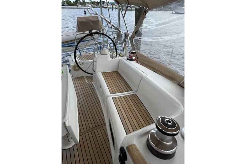 Vision 360 Yacht Photos Pics Beneteau First 435 sailboat cockpit with teak flooring, 2012 model, docked by the water.
