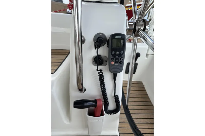 Vision 360 Yacht Photos Pics Control panel on a 2012 Beneteau First 435 sailboat with radio and handle.