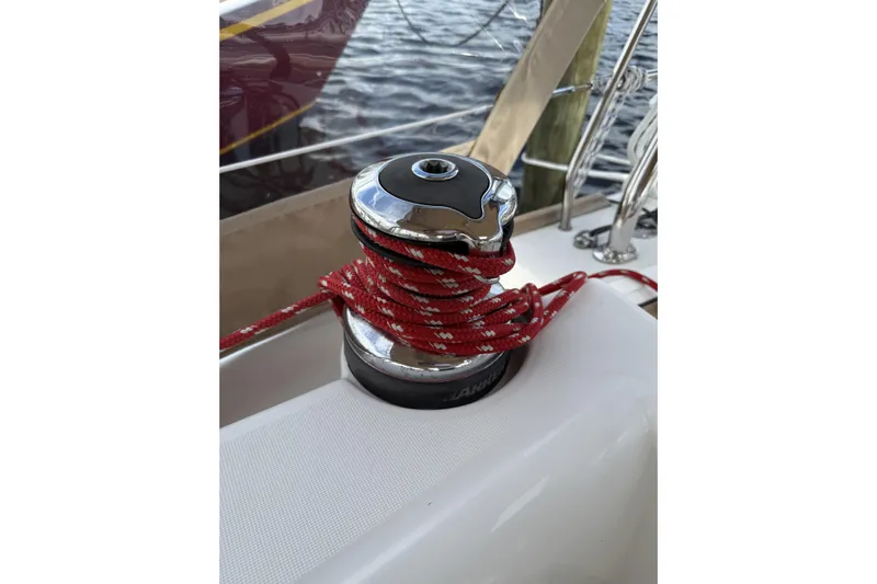 Vision 360 Yacht Photos Pics Winch with red rope on 2012 Beneteau First 435 sailboat deck.