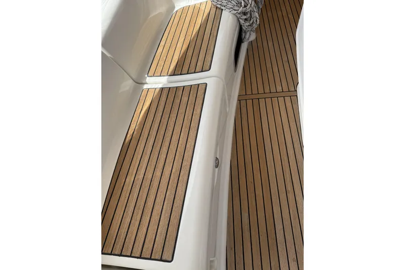 Vision 360 Yacht Photos Pics Teak deck of 2012 Beneteau First 435 sailboat, showcasing elegant wood finish.