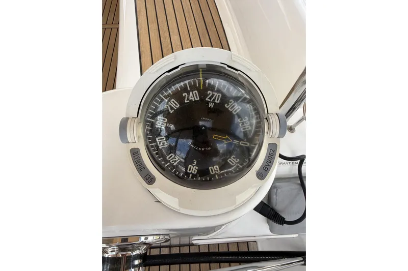 Vision 360 Yacht Photos Pics Compass on Beneteau First 435 yacht, 2012 model, with teak deck background.