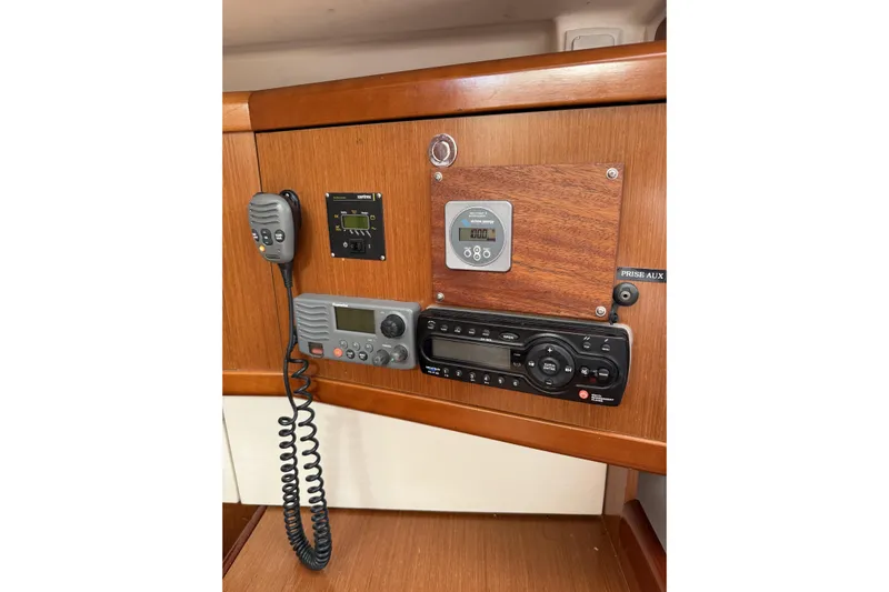 Vision 360 Yacht Photos Pics Control panel on a 2012 Beneteau First 435 yacht with radio and navigation equipment.