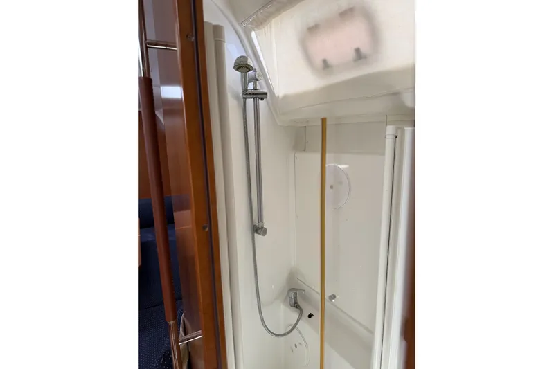 Vision 360 Yacht Photos Pics Beneteau First 435 2012 yacht shower area with modern fixtures and wooden accents.