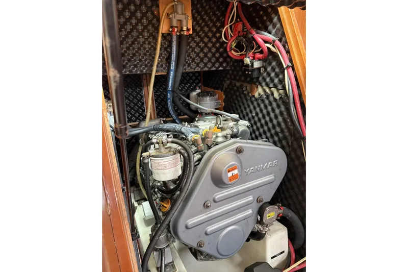 Vision 360 Yacht Photos Pics Engine compartment of a 2012 Beneteau First 435 sailboat, featuring a Yanmar engine.