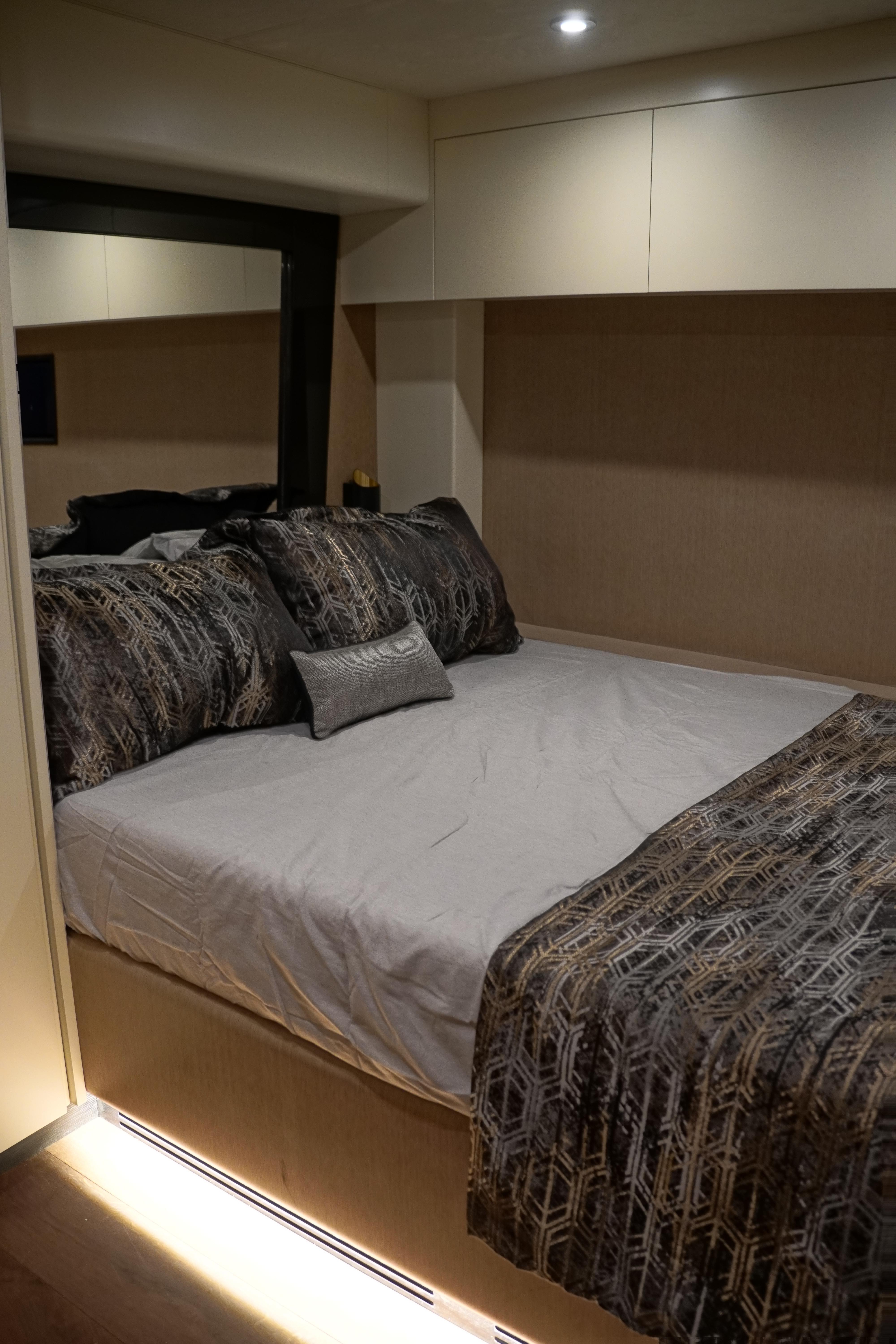 Luxurious bedroom interior in 2026 Phantom Spook Fly 62 yacht.