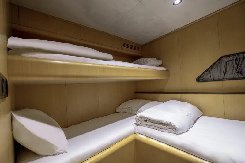  Yacht Photos Pics Compact cabin with bunk beds in 2026 Phantom Spook Fly 62 yacht.