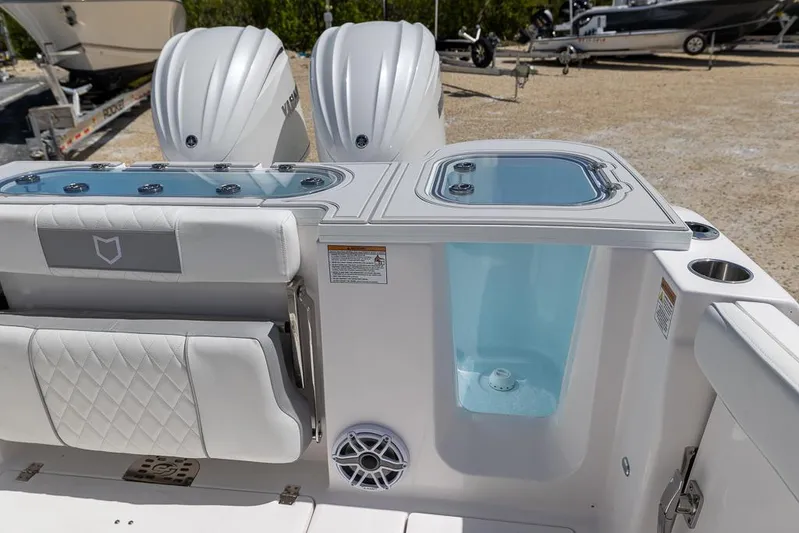  Yacht Photos Pics 2026 Sea Fox 288 Commander boat interior with dual engines and seating.