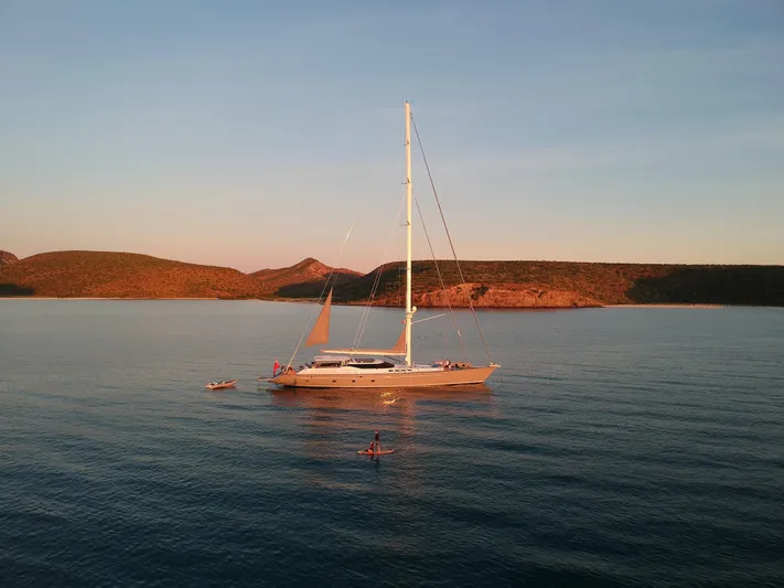 My Star Yacht Photos Pics 1994 Alloy Yachts Sloop sailing at sunset in tranquil waters.
