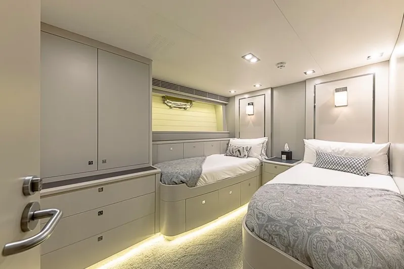 My Star Yacht Photos Pics Luxurious twin bedroom in 1994 Alloy Yachts Sloop, featuring modern design and ambient lighting.