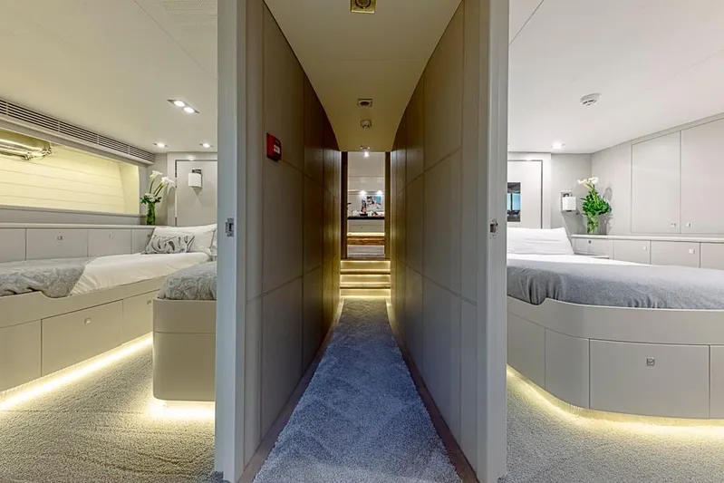 My Star Yacht Photos Pics Luxurious interior of 1994 Alloy Yachts Sloop, featuring elegant twin bedrooms and ambient lighting.