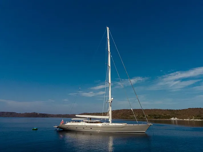 My Star Yacht Photos Pics Sleek 1994 Alloy Yachts Sloop sailing on calm waters under a clear blue sky.