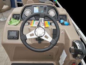 2024 Ranger 200F boat dashboard with steering wheel, navigation system, and controls.