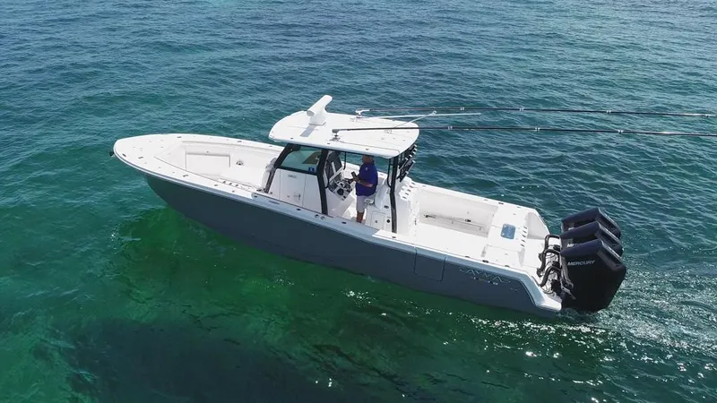  Yacht Photos Pics 2025 Caymas 341 CC boat on clear blue ocean water.