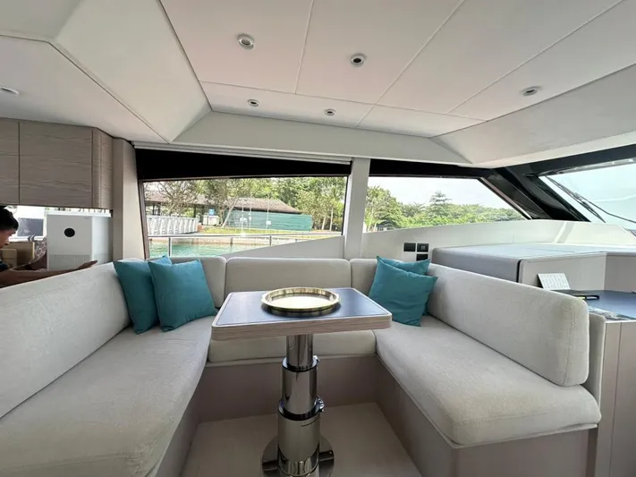  Yacht Photos Pics Luxurious interior of 2023 Ferretti Yachts 500 with elegant seating and modern design.