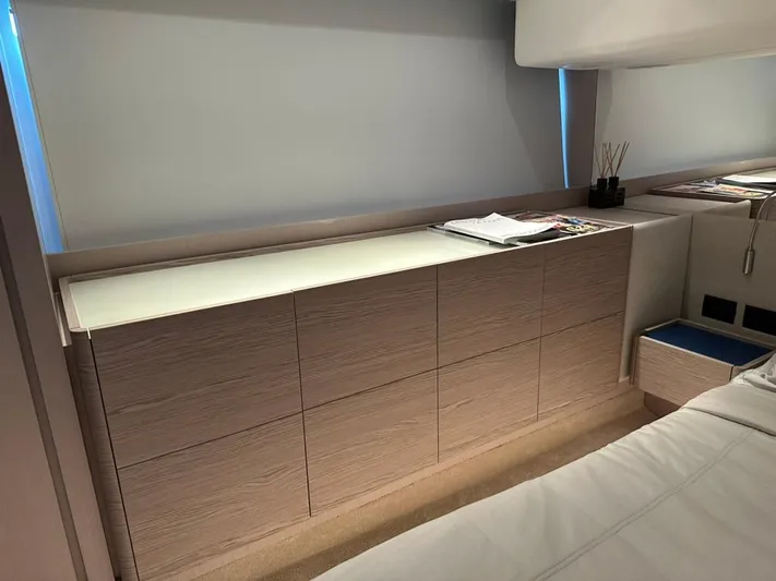  Yacht Photos Pics Luxurious interior of 2023 Ferretti Yachts 500, featuring sleek cabinetry and modern design.