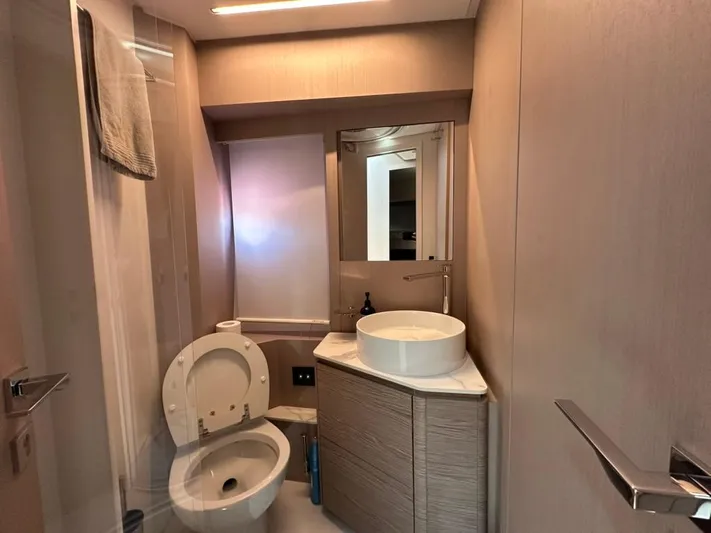  Yacht Photos Pics Modern bathroom in 2023 Ferretti Yachts 500, featuring sleek fixtures and elegant design.