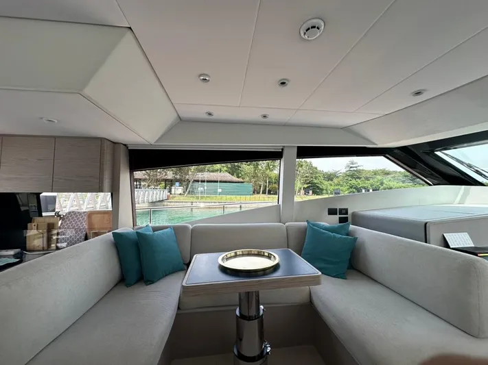  Yacht Photos Pics Luxurious interior of 2023 Ferretti Yachts 500 with elegant seating and modern design.