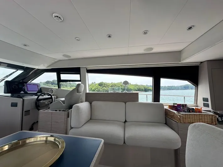  Yacht Photos Pics Luxurious interior of 2023 Ferretti Yachts 500 with scenic water view.