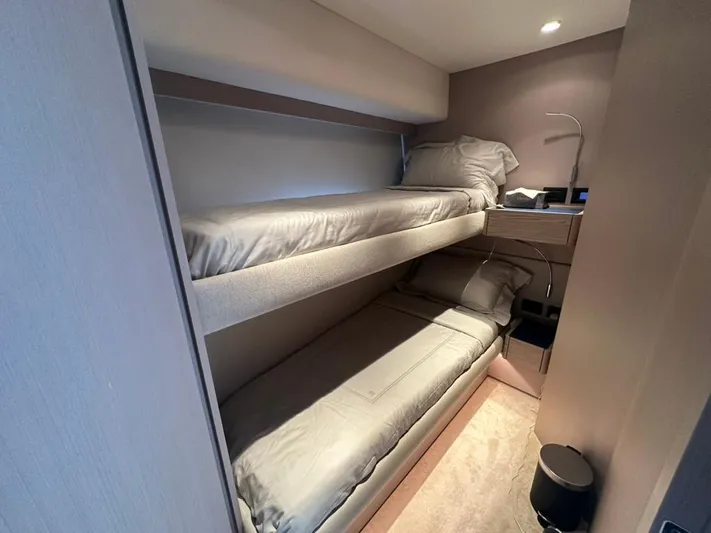 Yacht Photos Pics 2023 Ferretti Yachts 500 cabin with modern bunk beds and sleek design.