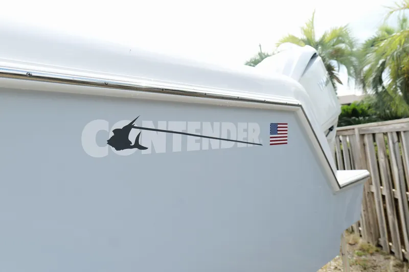  Yacht Photos Pics 2024 Contender 35 ST boat with logo and American flag decal.
