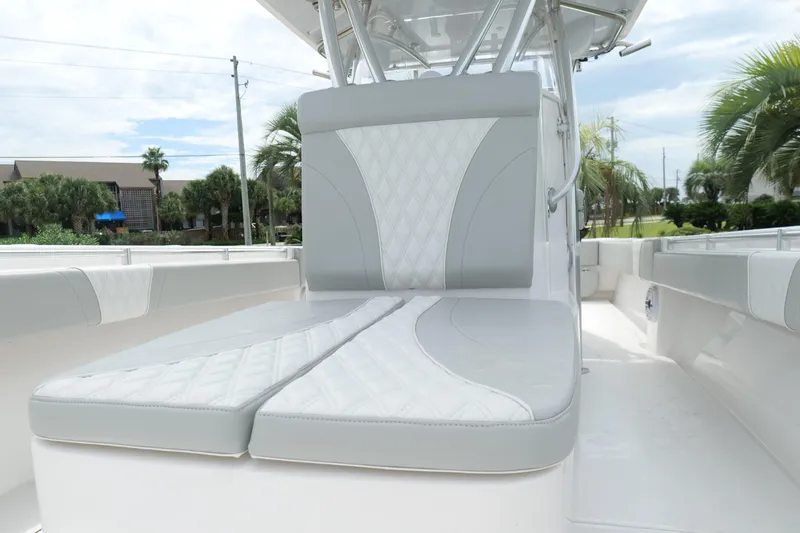  Yacht Photos Pics 2024 Contender 35 ST boat interior with cushioned seating and sleek design.