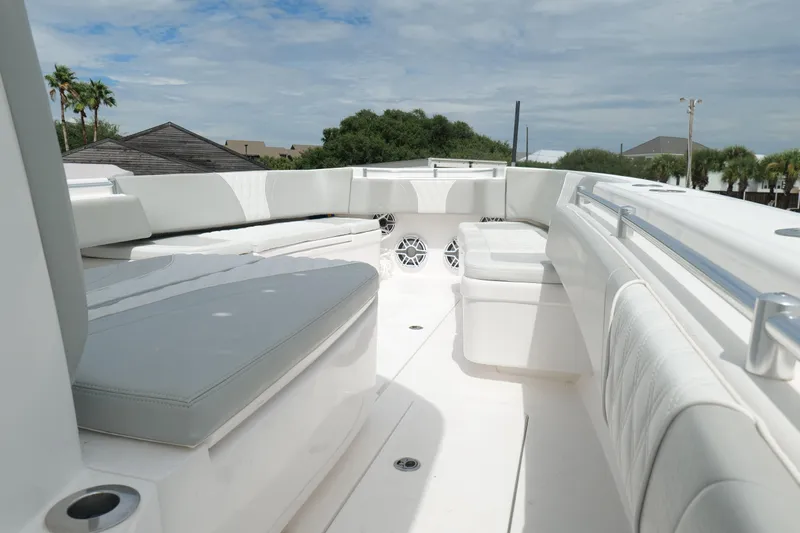  Yacht Photos Pics 2024 Contender 35 ST boat interior with white seating and sleek design.