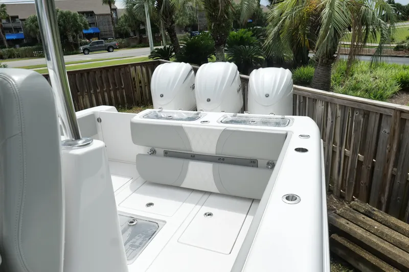  Yacht Photos Pics 2024 Contender 35 ST boat with triple engines, sleek design, and spacious deck.