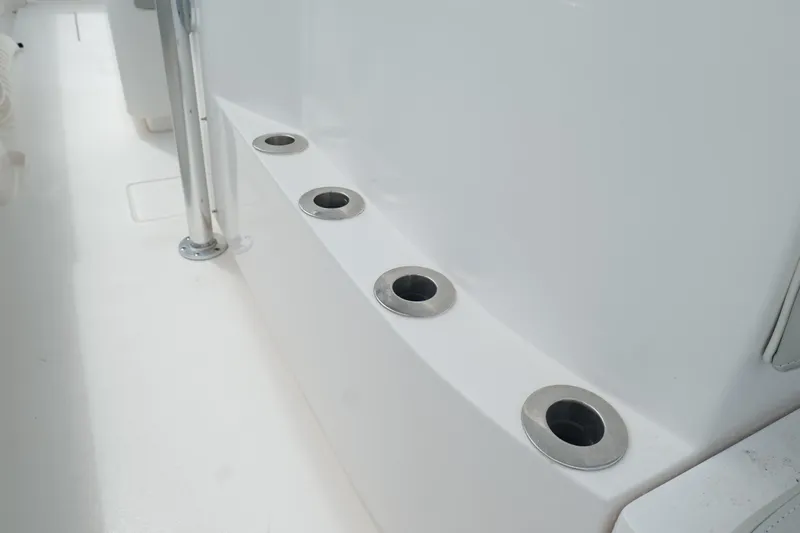  Yacht Photos Pics 2024 Contender 35 ST boat rod holders on sleek white deck.